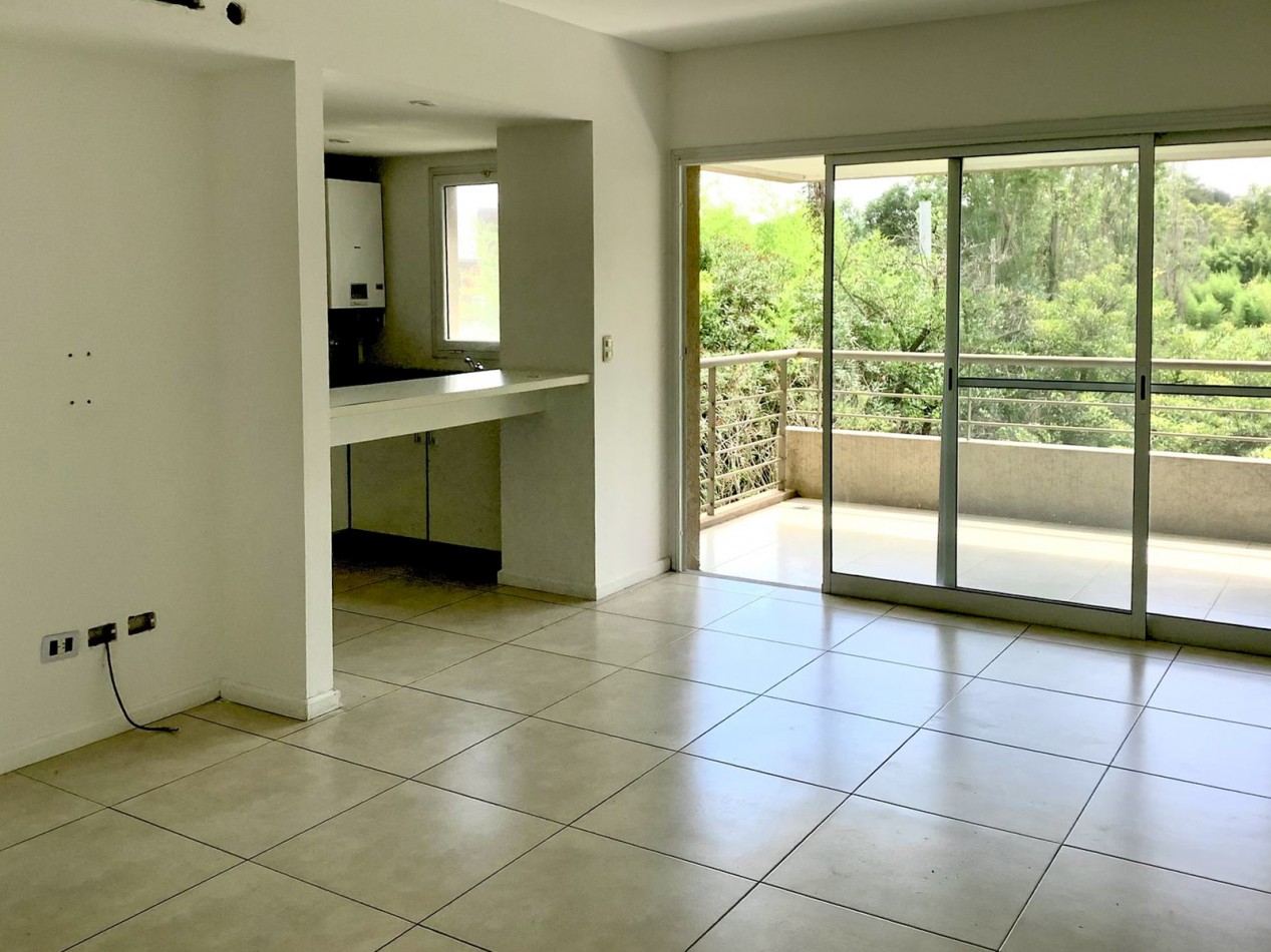 DEPARTAMENTO 2 AMBIENTES C/ COCHERA Y PARRILLA